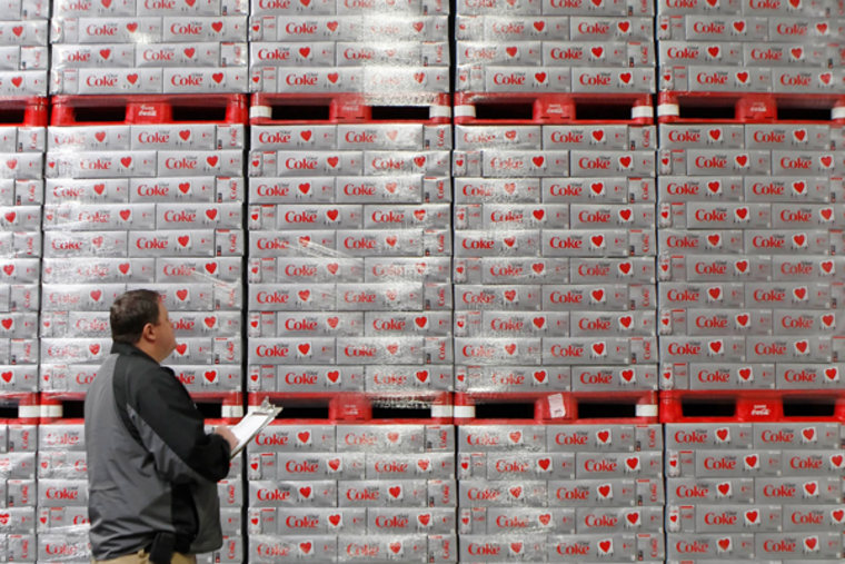 Image: Warehouse manager Chad Sadler inventories cases of Diet Coke in a warehouse at the Swire Coca-Cola facility in Draper